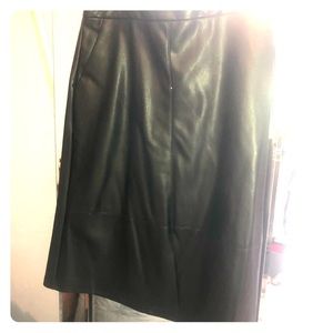 Faux leather black skirt with pockets. Brand new.